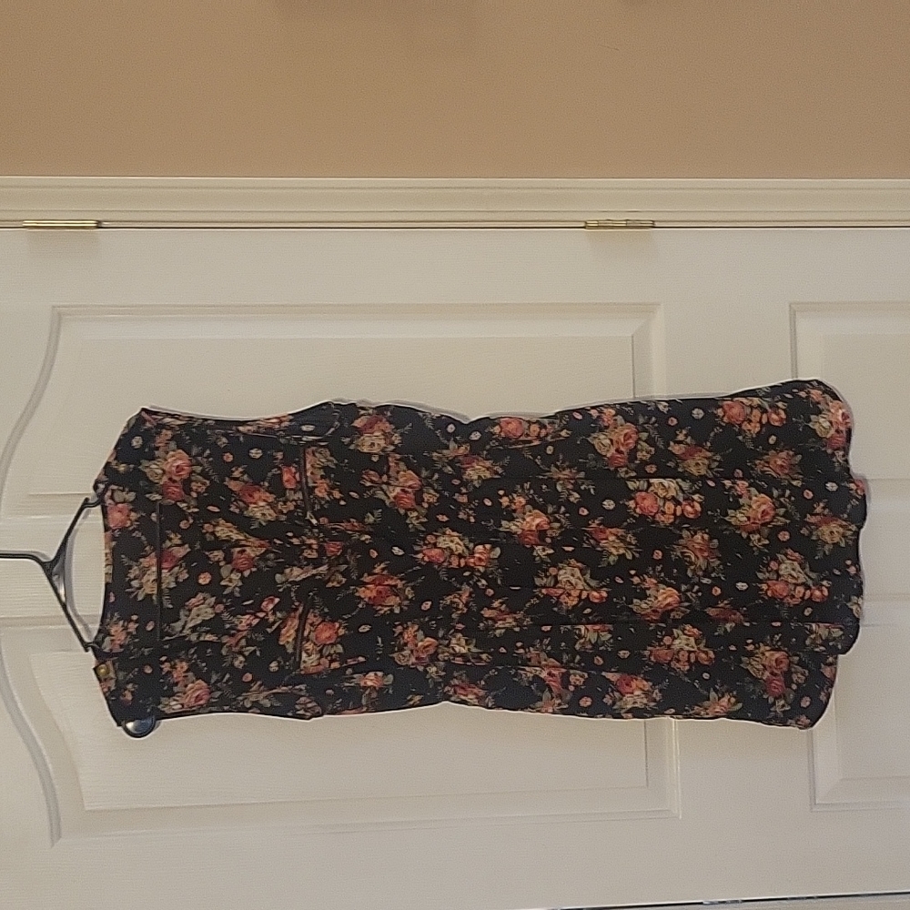 Sleeveless dress, V slit neck, black with floral print.  Lined skirt.